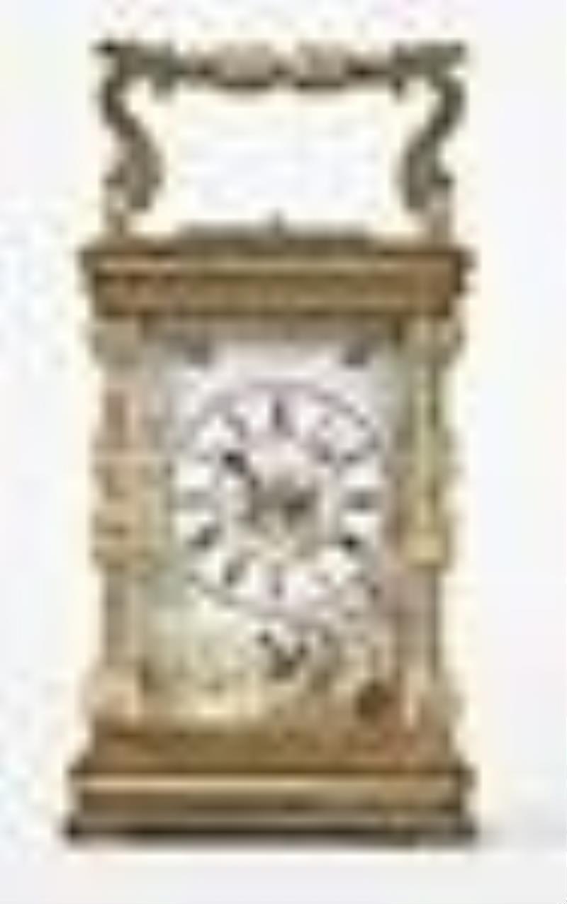 A late 19th century French carriage clock with polychrome enamel dial