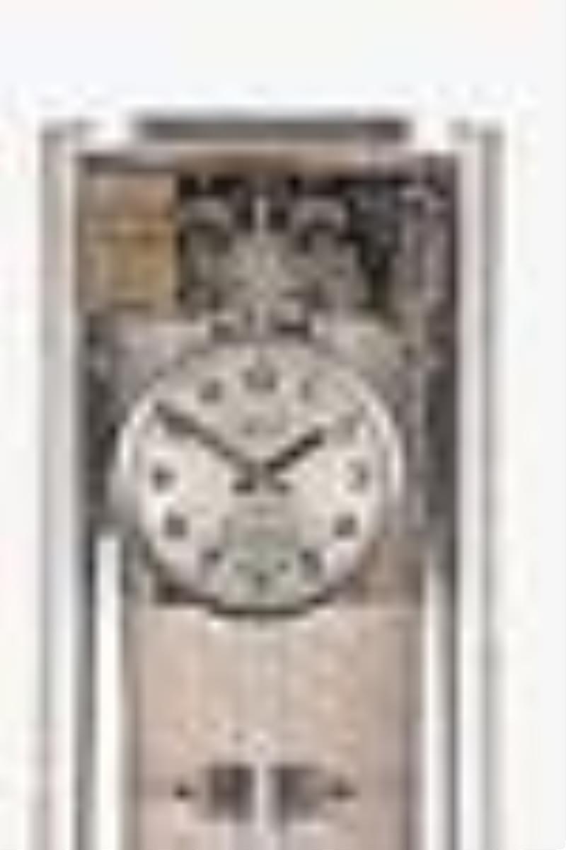A mid 20th century electromagnetic seconds beating crystal master clock signed Favag