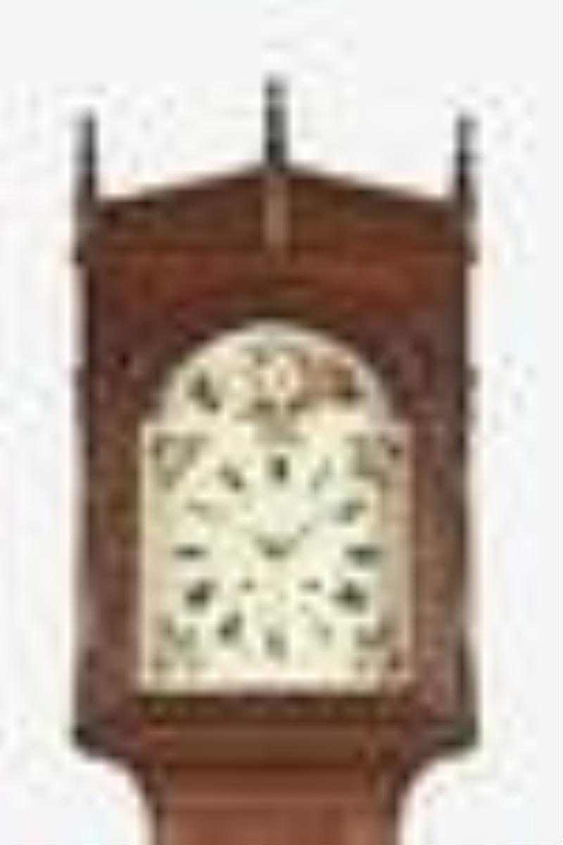 An 8 day mid 19th century walnut Pennsylvania tall clock with Black Forest movement