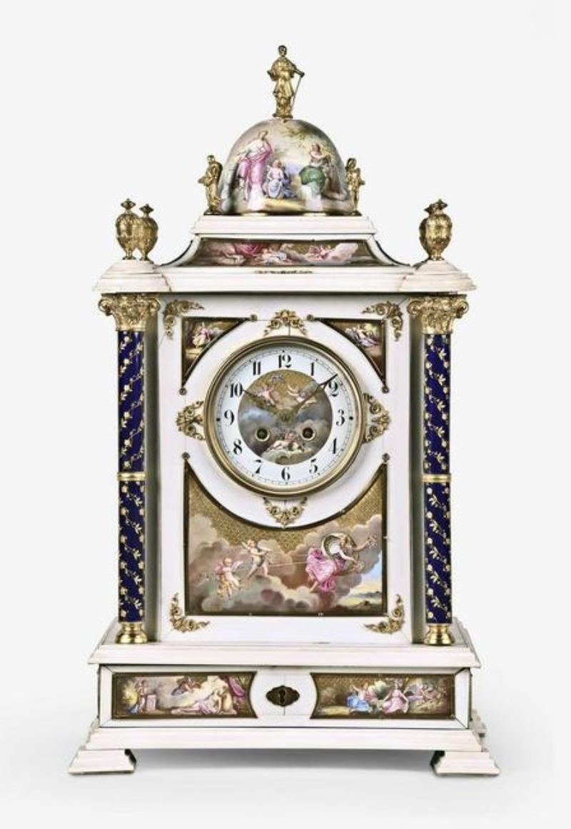 An unusual large late 19th century Austro Hungarian ivory and enamel table clock