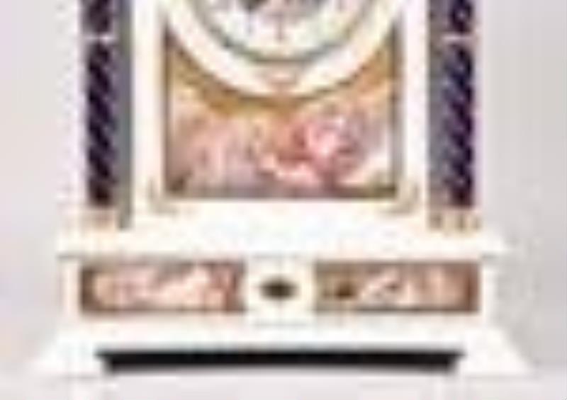 An unusual large late 19th century Austro Hungarian ivory and enamel table clock