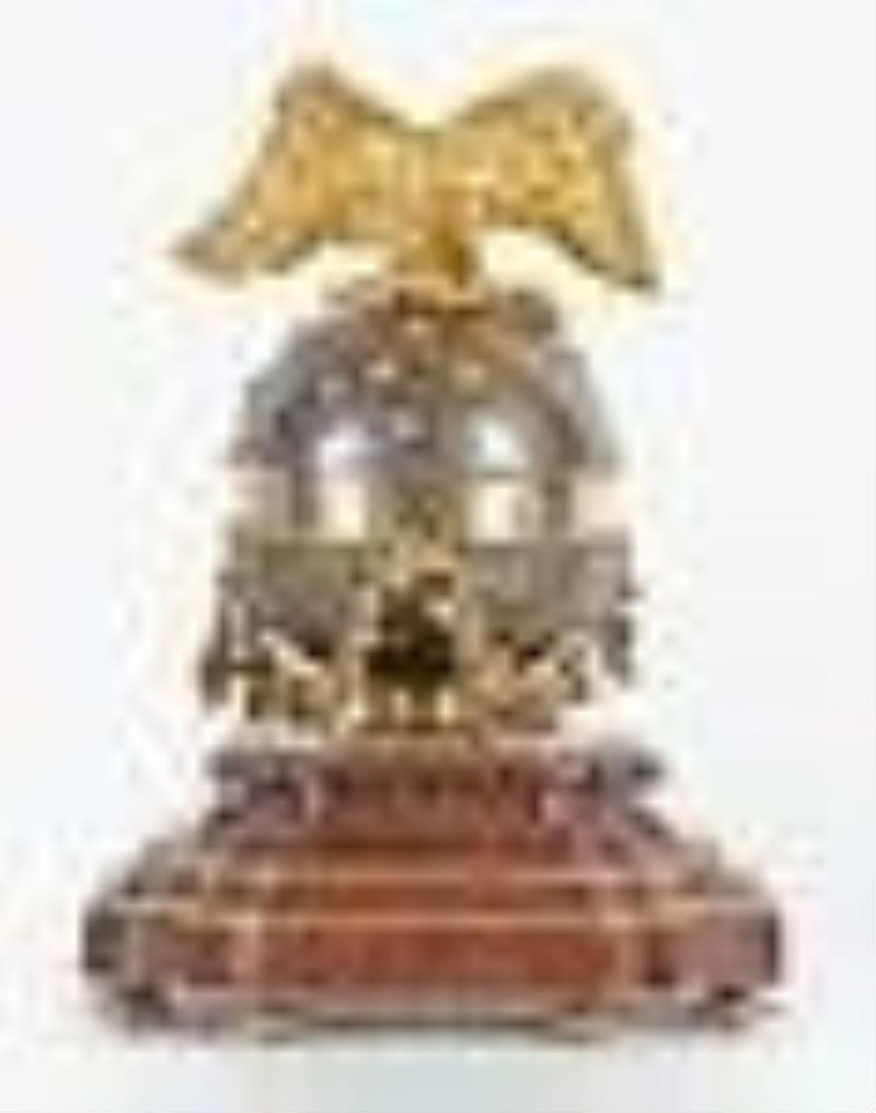 A good late 19th century figural annular mantel clock by Dumoulinneuf Paris