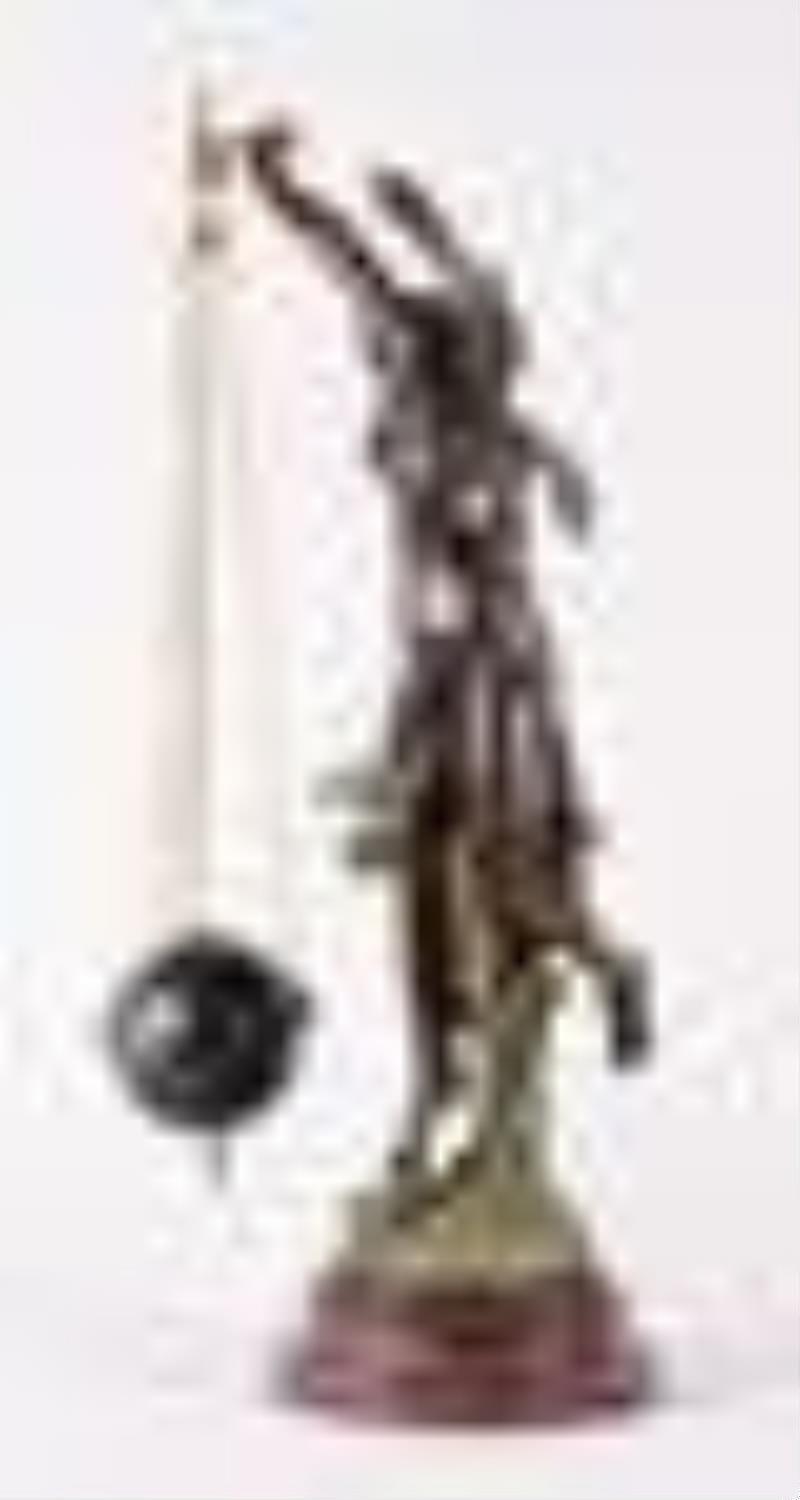 A good late 19th century French figural conical pendulum clock