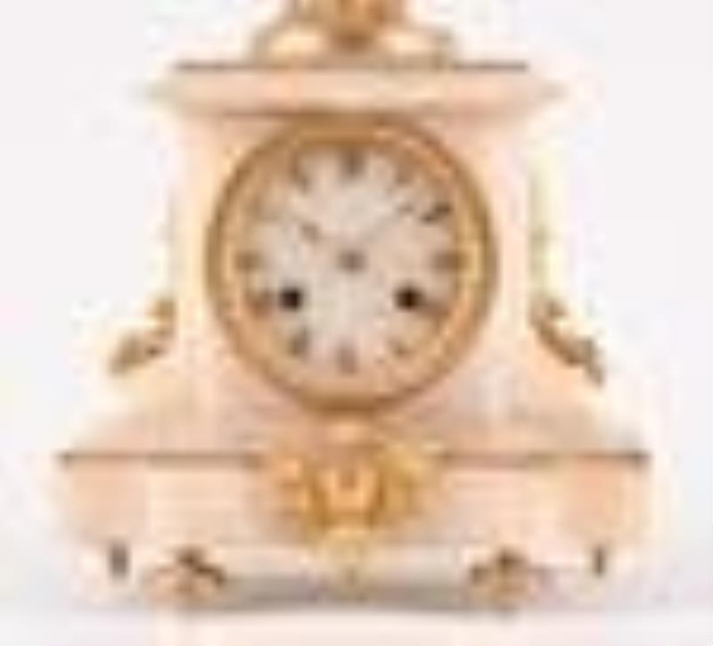 A figural swinging mystery clock with crank and stirrup escapement by Guilmet