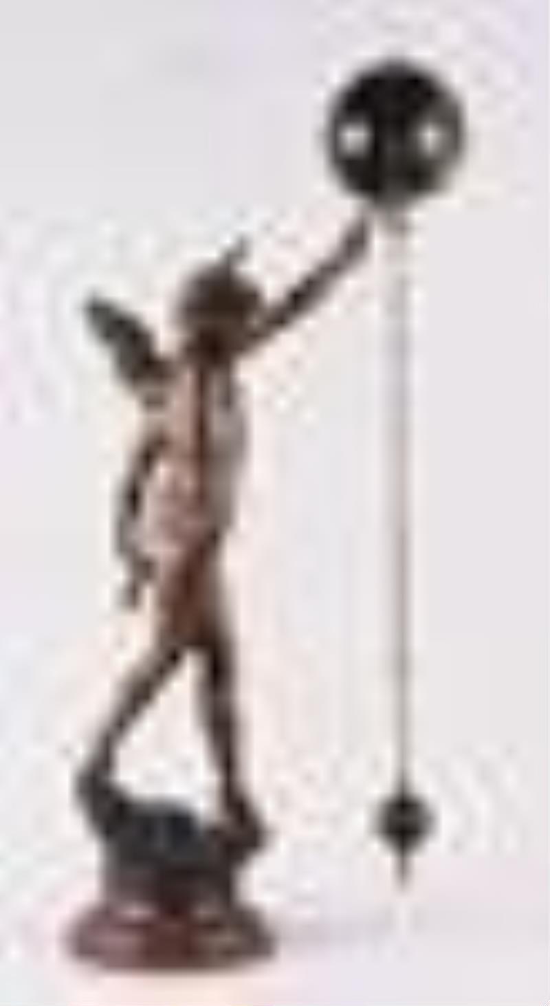 A large late 19th century French figural swinging mystery clock