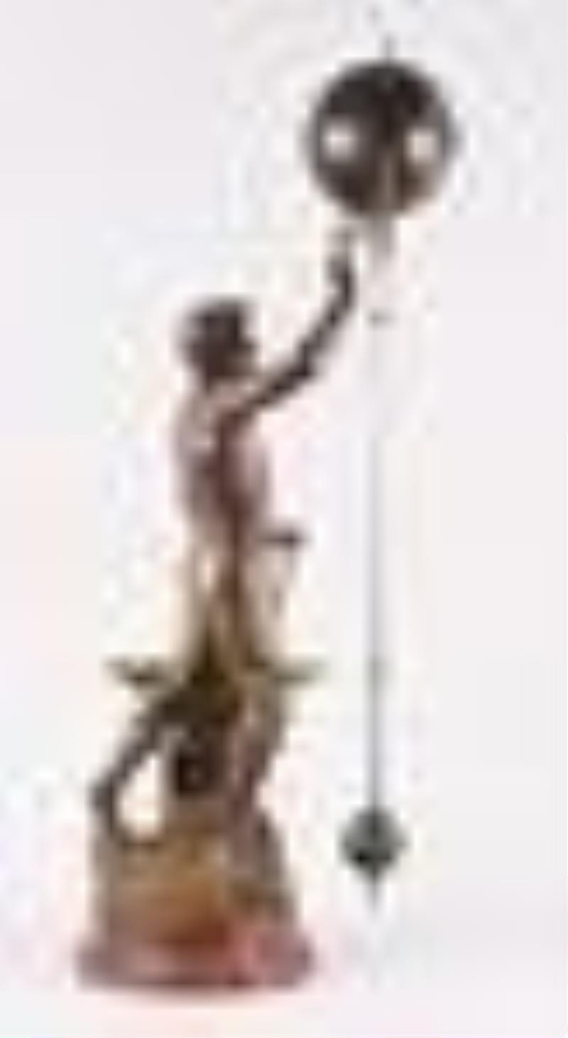 A large turn of the 20th century French figural swinging mystery clock