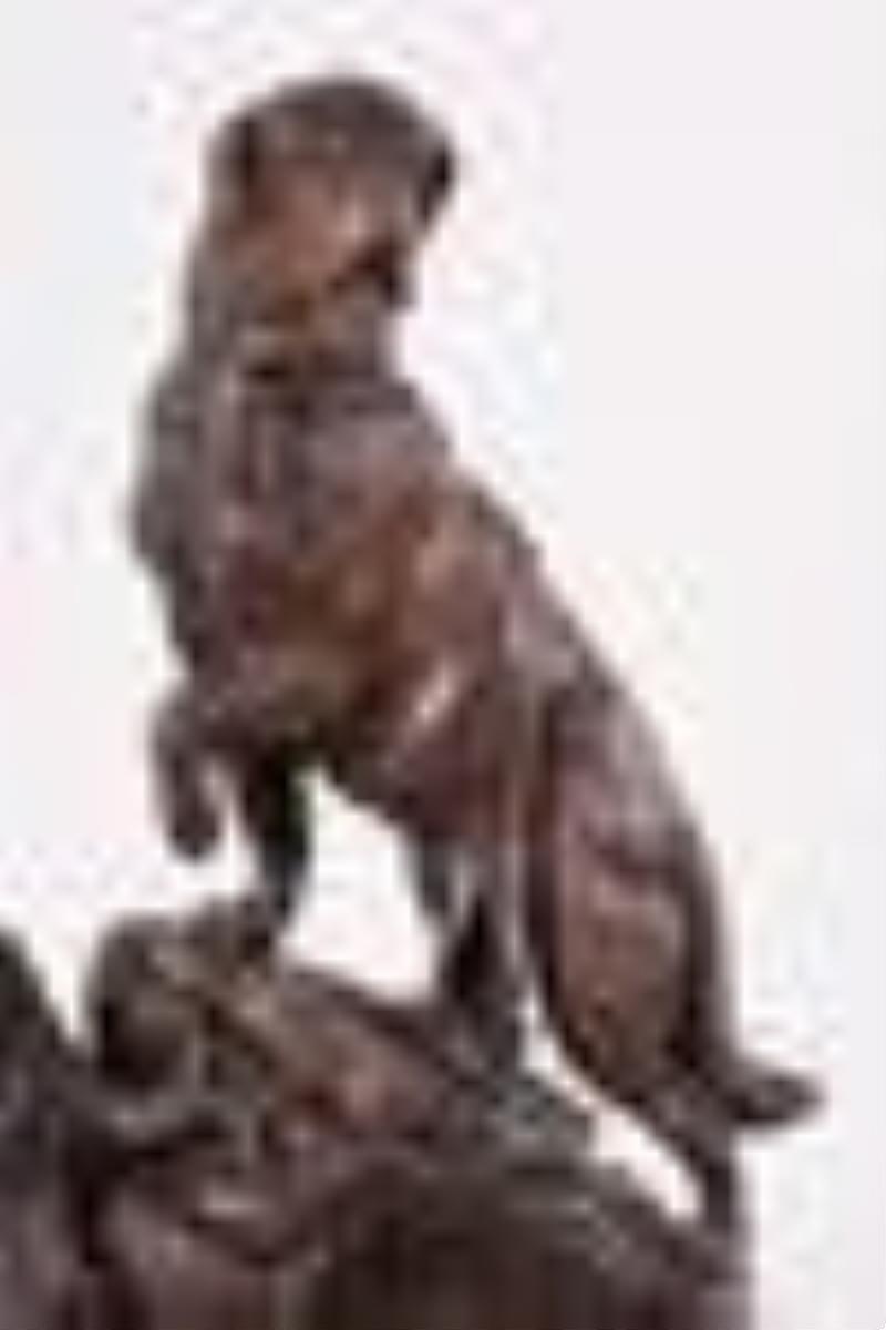 A good turn of the 20th century carved figural Black Forest clock with St. Bernard