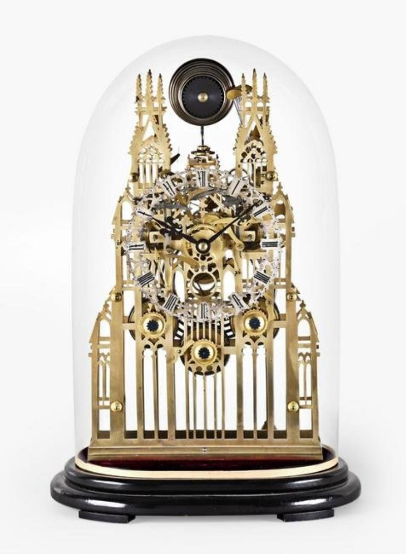 A large three train York Minster skeleton clock attributed to Evans