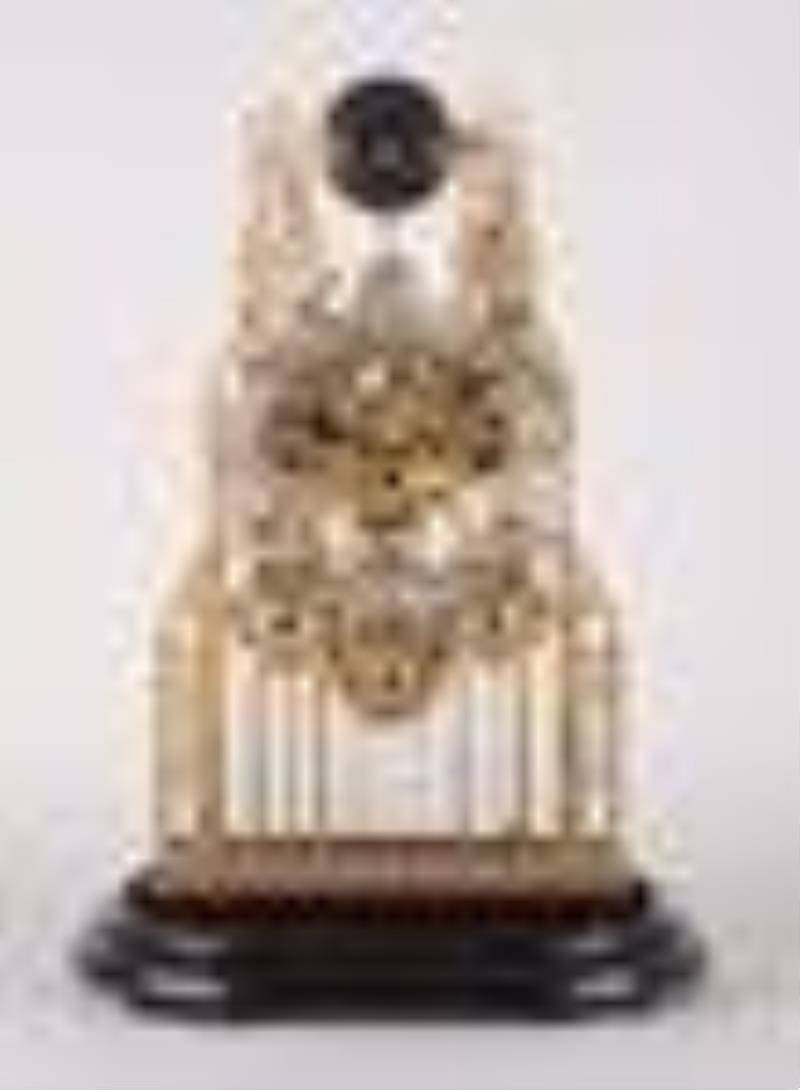 A large three train York Minster skeleton clock attributed to Evans