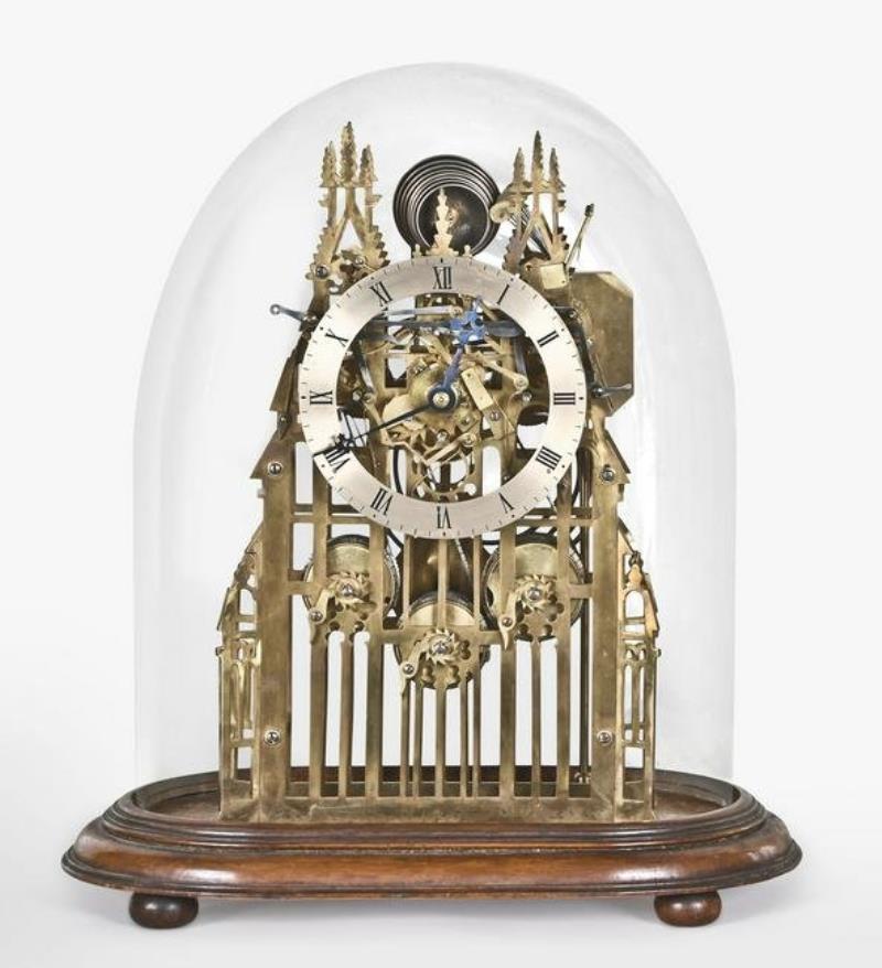 A large three train York Minster skeleton clock attributed to Evans