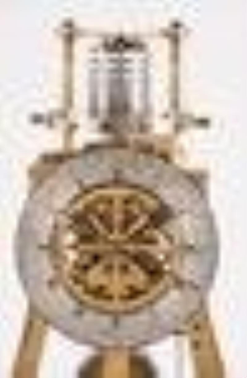 A 20th century skeleton clock with chronometer escapement by E.J. Dent & Co. Ltd. London