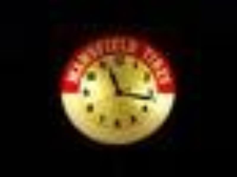 Mansfield Tires lighted clock
