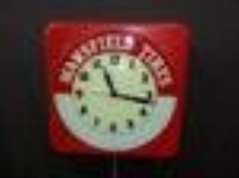 Mansfield Tires lighted clock