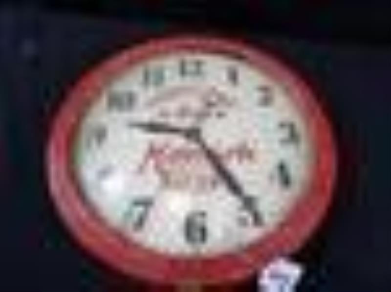 Early wood framed Monark Battery clock