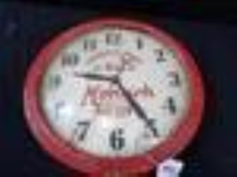 Early wood framed Monark Battery clock