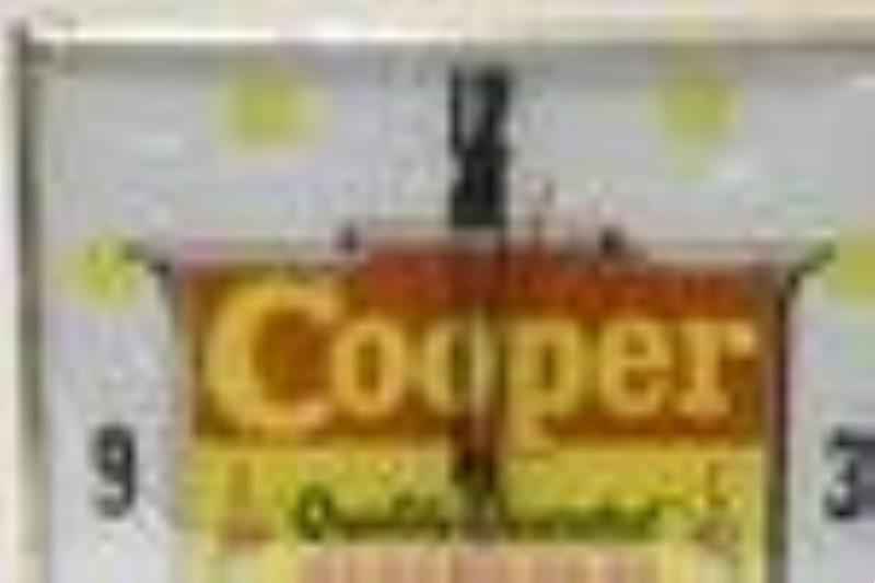 Vintage Cooper Feeds Lighted Adv PAM Clock
