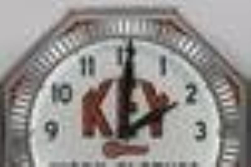 Key Work Clothes Neon Illusion Wheel Clock By NPI