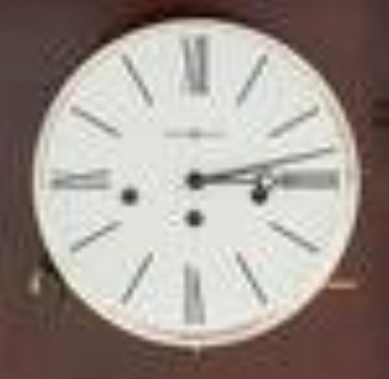 Howard Miller Modern Demilune Case Clock