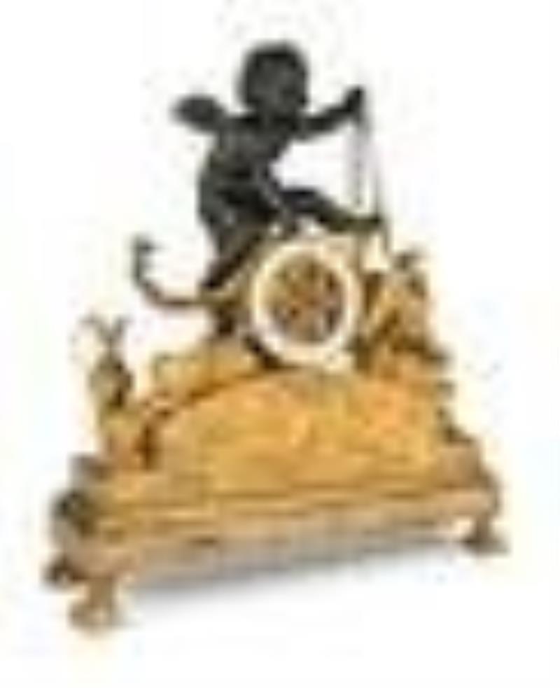 A Large Empire Ormolu and Green Patinated Bronze Figural Clock
