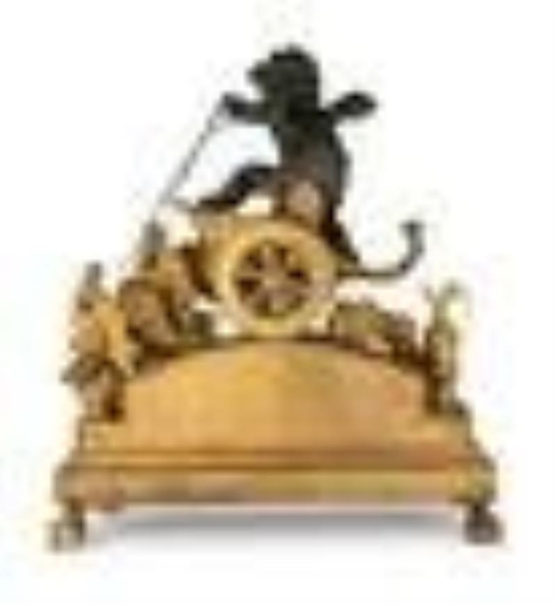 A Large Empire Ormolu and Green Patinated Bronze Figural Clock