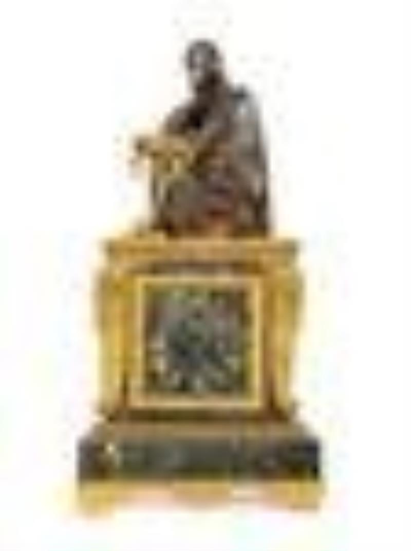 A Louis Philippe Verde Antico Marble, Gilt and Patinated Bronze Figural Mantel Clock