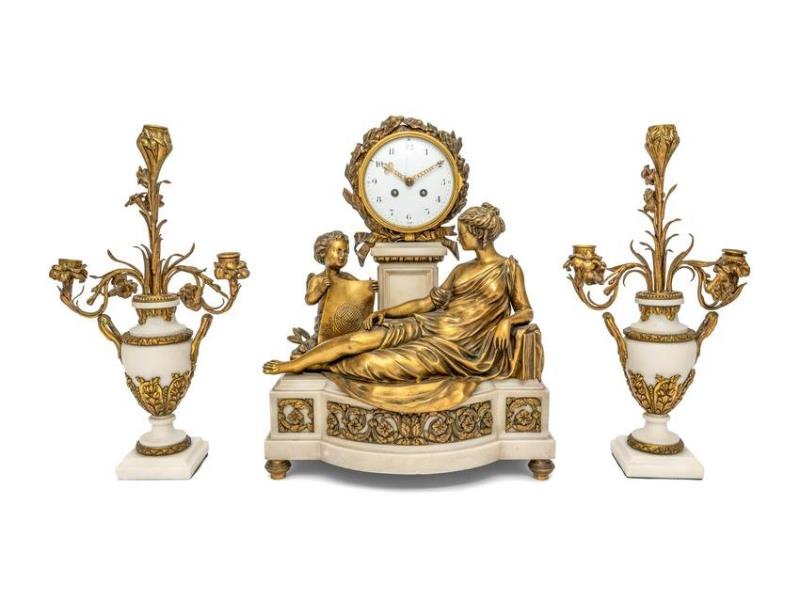 A French Gilt Bronze and Marble Clock Garniture