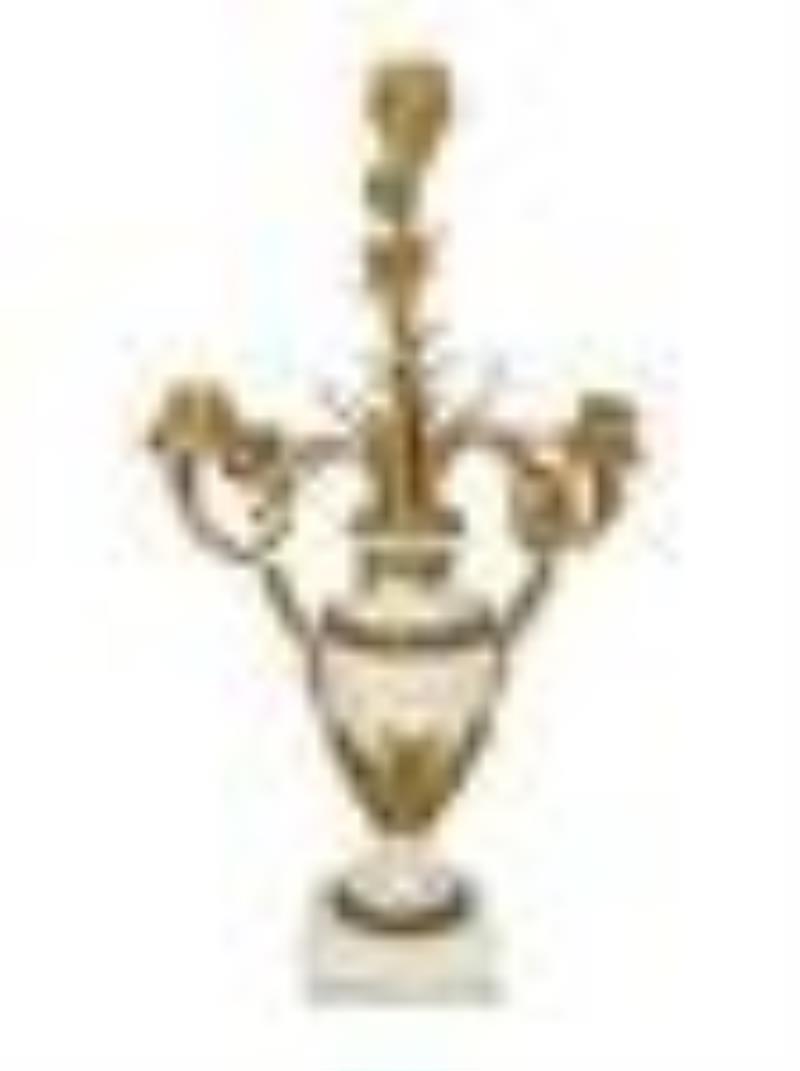 A French Gilt Bronze and Marble Clock Garniture