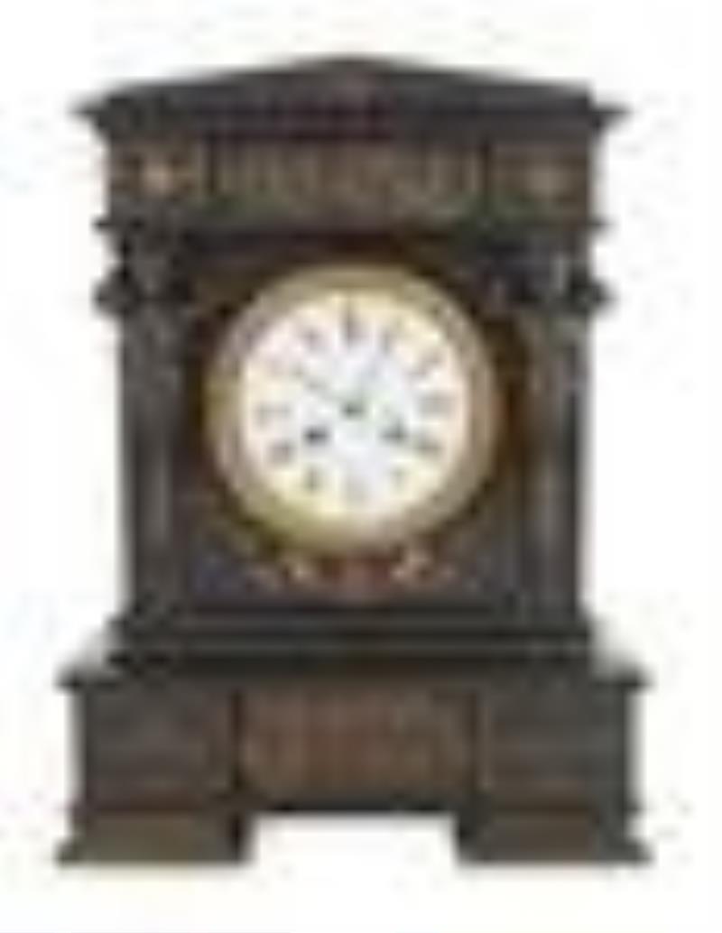 A French Bronze and Slate Mantel Clock