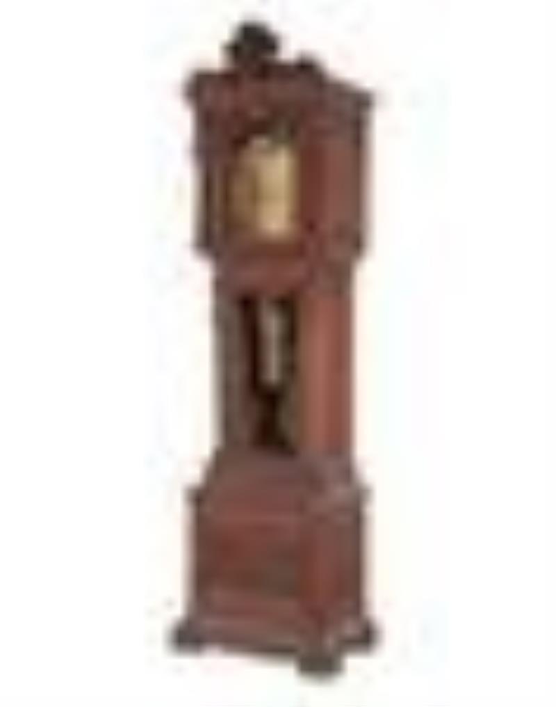 A Renaissance Revival Carved Walnut Tall Case Clock
