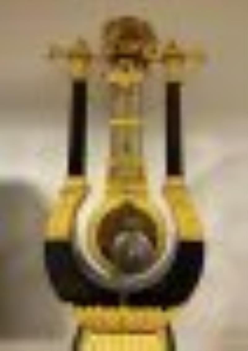 Rare A. Courbet, Ormolu-Mounted & Ebonized Striking Lyre Clock, circa 1815