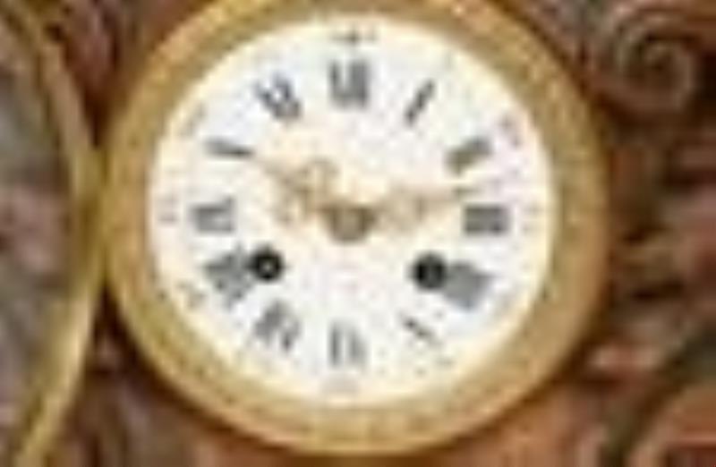 Black Forest Figural Carved Mantel Clock