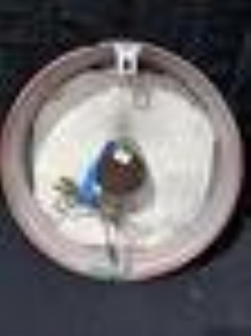 Wynn's Friction Proofing Advertising Clock