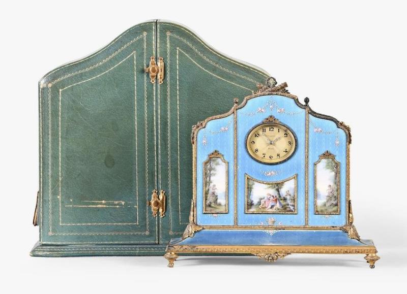 A very decorative early 20th century enamel desk or bedside clock by Poljoux