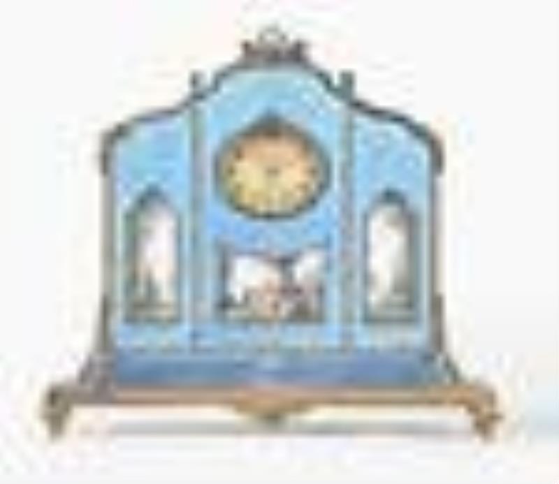 A very decorative early 20th century enamel desk or bedside clock by Poljoux