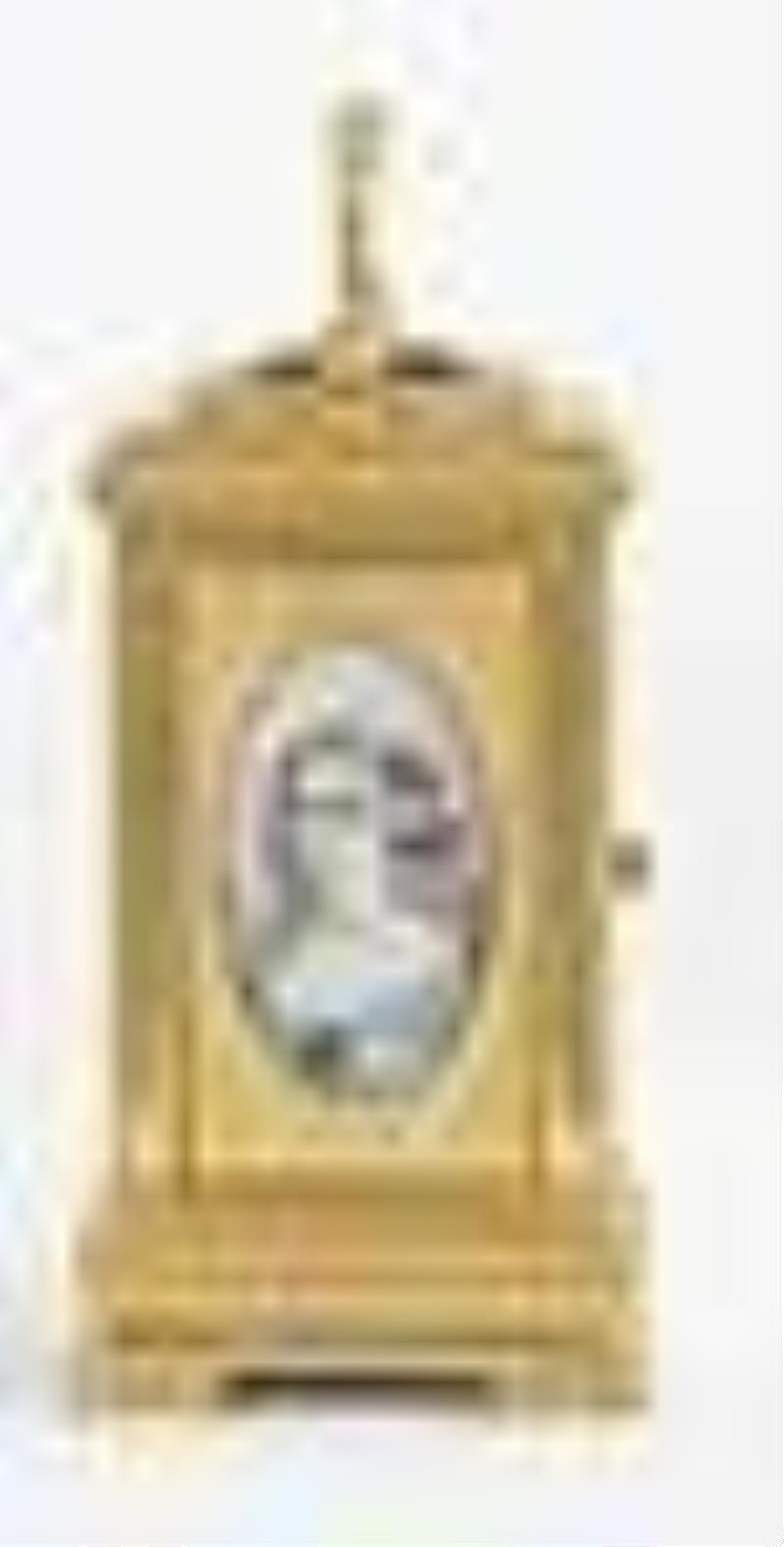 A fine mignonnette #1 carriage clock with portrait panels and travel case