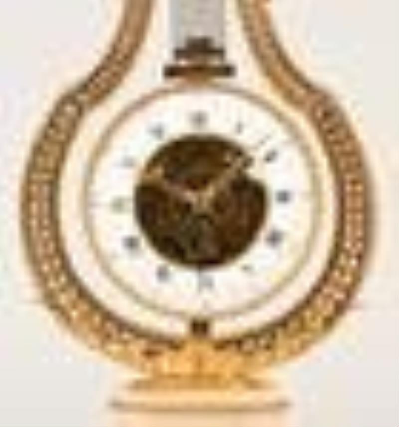 A fine late 18th century swinging lyre mantel clock by Breant