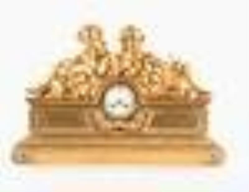 A monumental gilt bronze figural mantel clock in the Louis XVI style signed Robin Her du Roi