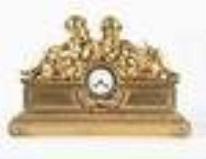 A monumental gilt bronze figural mantel clock in the Louis XVI style signed Robin Her du Roi