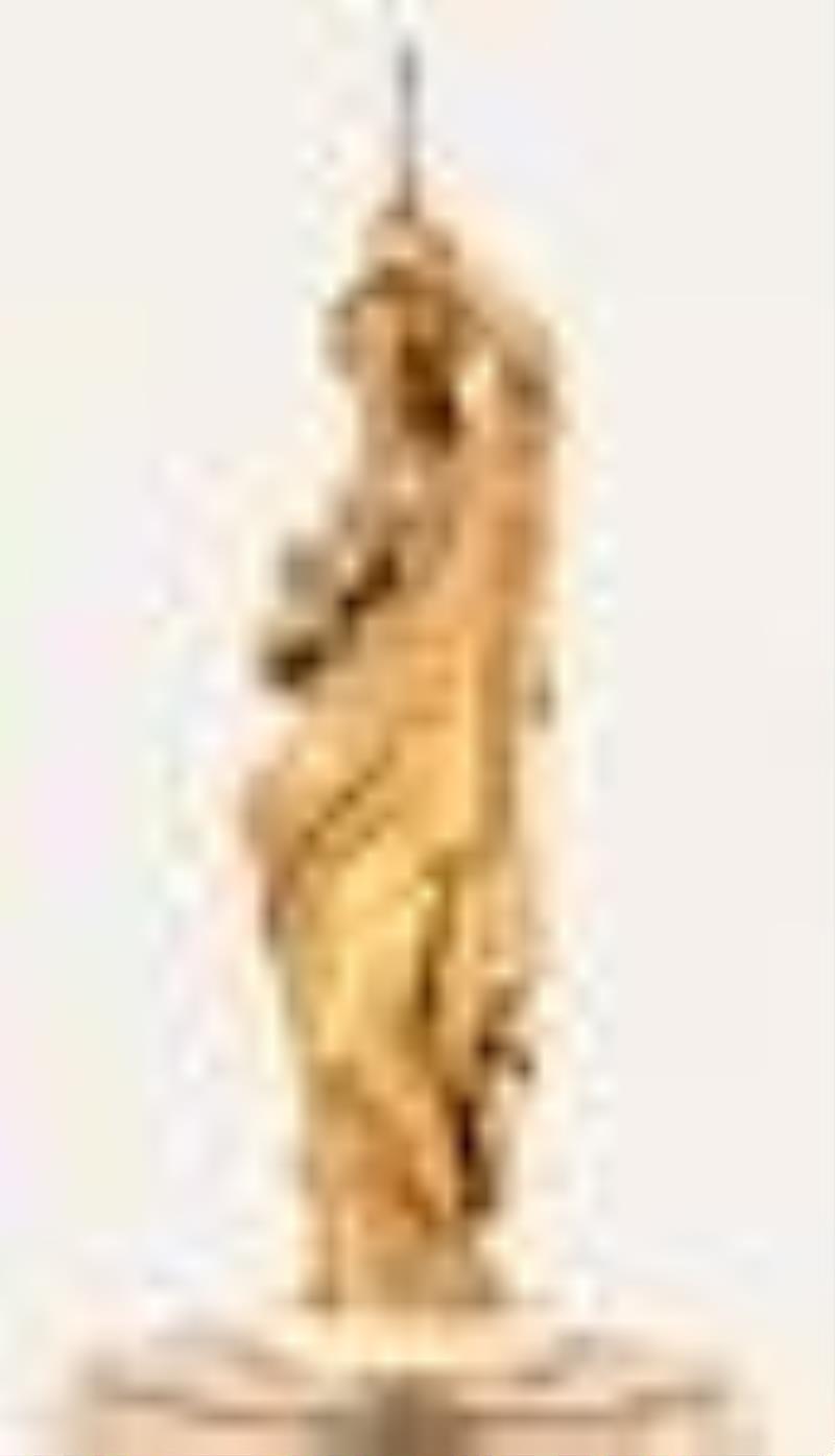 A late 19th century French figural mantel clock with conical pendulum