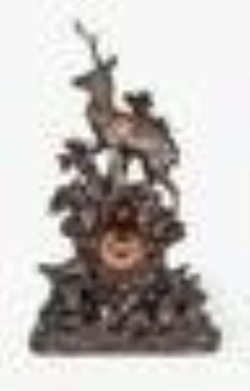 Black Forest monumental hand carved walnut mantel clock with stag in forest setting