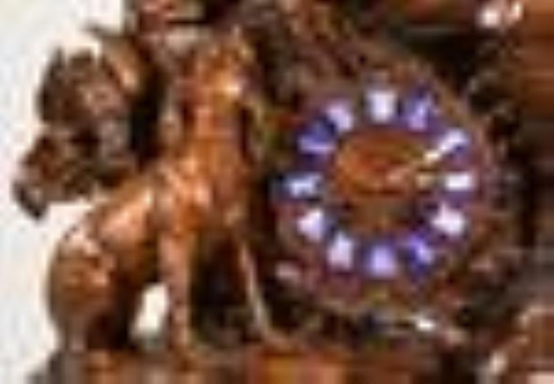 Black Forest musical shelf clock with hunting motif