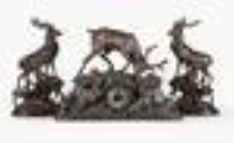 Black Forest three piece hand carved mantel clock garniture with stag