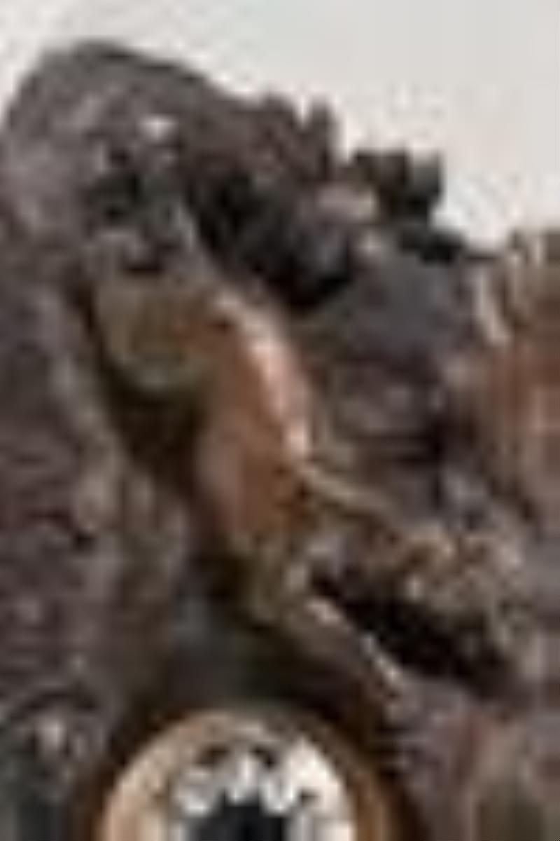 Black Forest three piece hand carved mantel clock garniture with stag