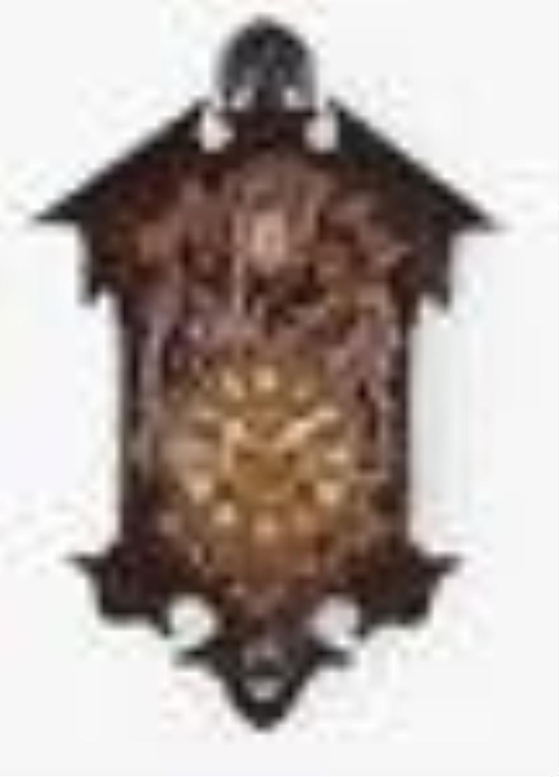 Ketterer Black Forest cuckoo wall clock with applied carved front depicting hunter scene