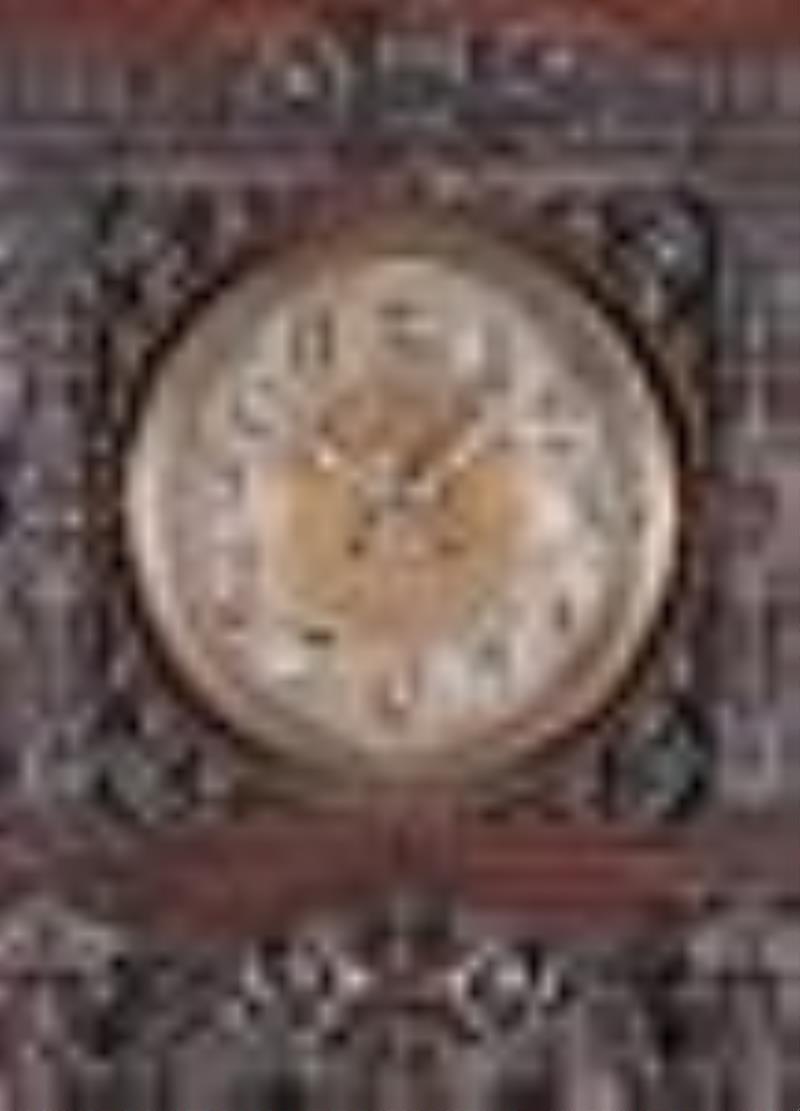 A spectacular late 19th century carved Columbian Exposition wall clock by F.X. Wildenauer