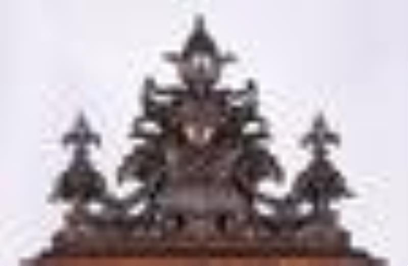 A spectacular late 19th century carved Columbian Exposition wall clock by F.X. Wildenauer