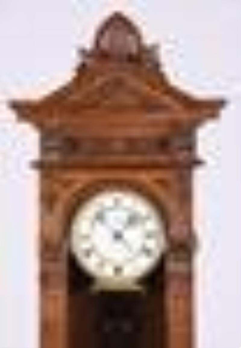 A late 19th century Vienna style patented one year clock