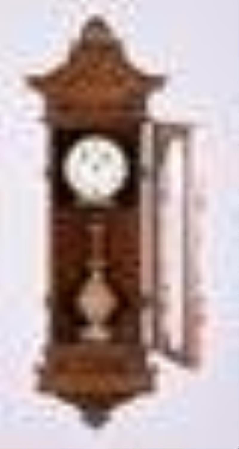 A late 19th century Vienna style patented one year clock