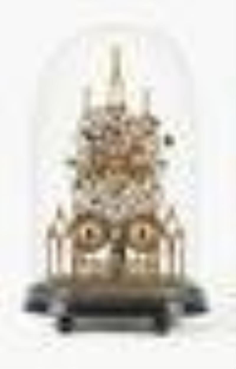 A good mid 19th century cathedral form skeleton clock attributed to Evans