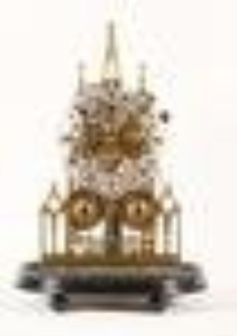 A good mid 19th century cathedral form skeleton clock attributed to Evans